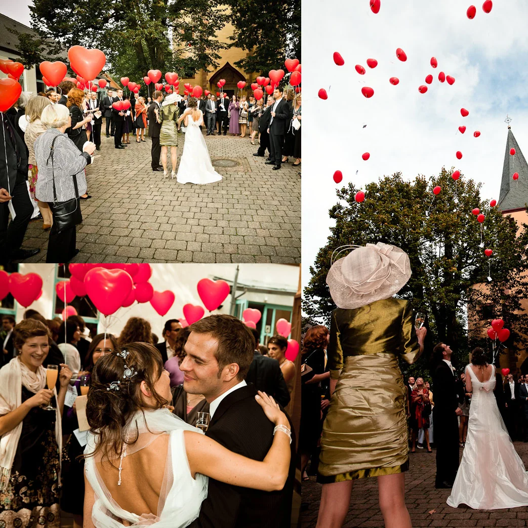 Rote Herzen und Luftballons für das Brautpaar – Hochzeitsreportage von Anna und Jan